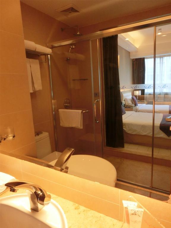 Guangzhou Bauhinia Hotel Kamer foto