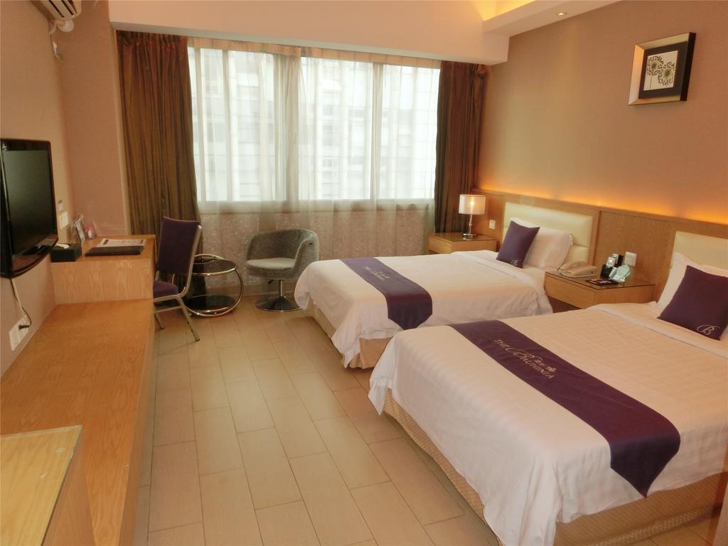 Guangzhou Bauhinia Hotel Kamer foto