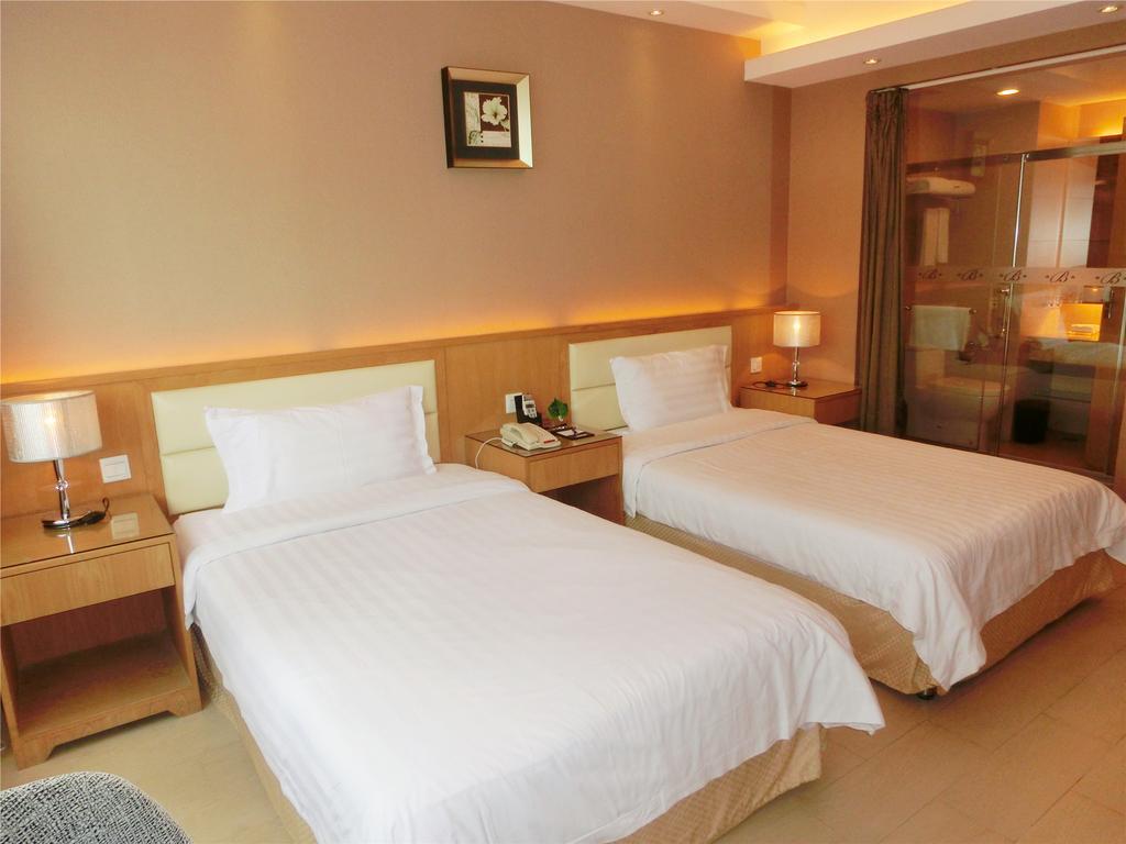 Guangzhou Bauhinia Hotel Kamer foto