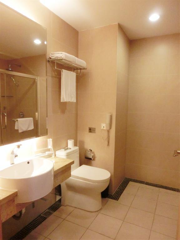 Guangzhou Bauhinia Hotel Kamer foto