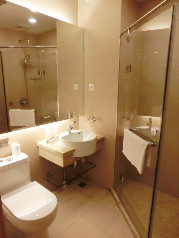 Guangzhou Bauhinia Hotel Kamer foto