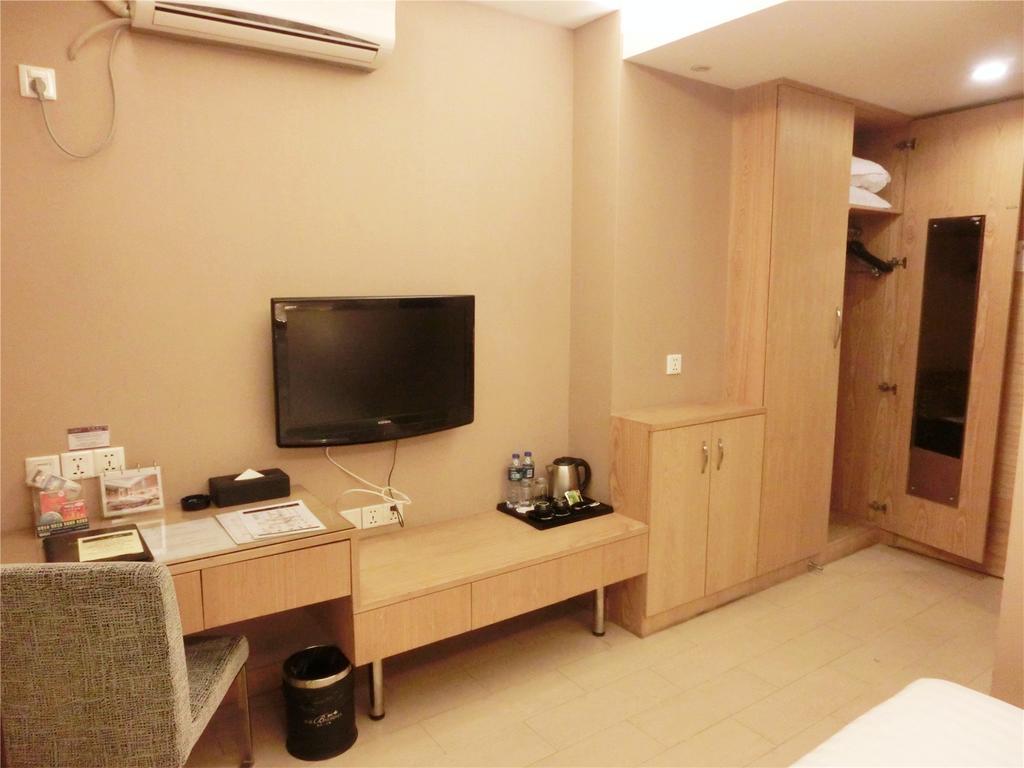Guangzhou Bauhinia Hotel Kamer foto